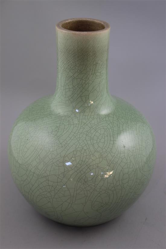 A Chinese mint green crackle glazed bottle vase, 19th / 20th century, 25cm